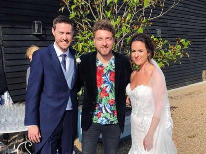 Tom Ryder with Sarah and Sam at their wedding at Preston Court in Kent