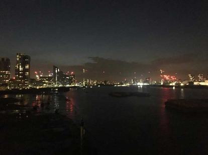 The night skyline over the water at Greenwich Yacht Club, where Kim and Will were married